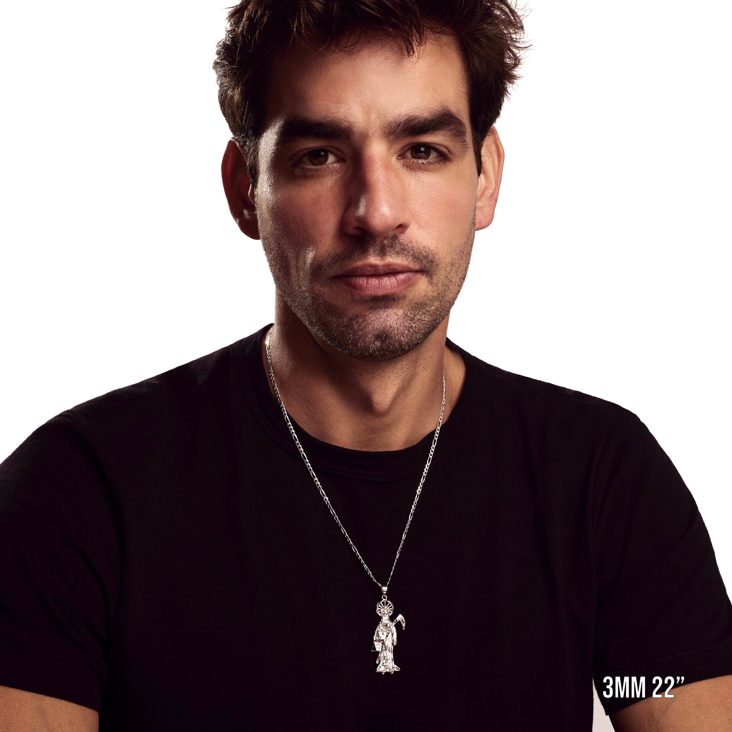 Model wearing 3mm 22” figaro chain with listed pendant.